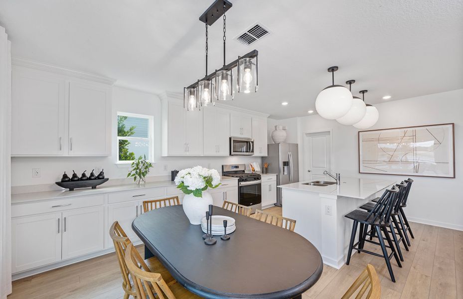 Representative furnished interior of a home built from the Pinecrest by Pulte Homes in Riversong, Parrish (Image 7).