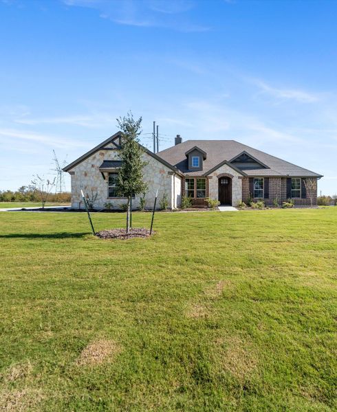 Front exterior of a new home in Parker Heights, Valley View, TX, highlighting curb appeal (Image 23). Front exterior of a new home in Parker Heights, Valley View, TX, highlighting curb appeal (Image 23).