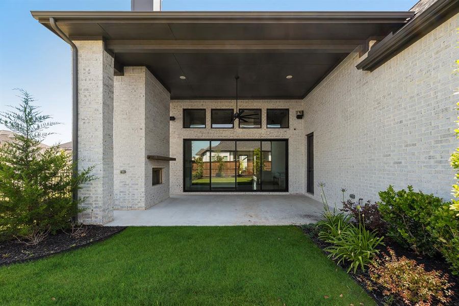 Exterior details and patio area of a home in Light Farms Graham/Reagan, Celina (Image 3).