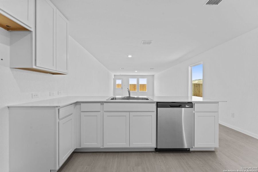 Furnished interior view inside a new home in Randolph Crossing: Cottage Collection, Converse (Image 5). Furnished interior view inside a new home in Randolph Crossing: Cottage Collection, Converse (Image 5).