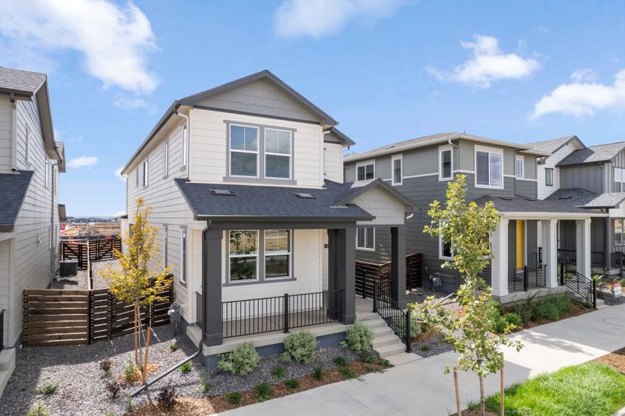 Front exterior of a new home in Barefoot Village, Firestone, CO, highlighting curb appeal (Image 24).
