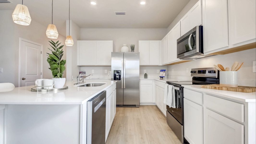Representative furnished interior of a home built from the Vale by D.R. Horton in The Gardens at Bay Street, Sarasota (Image 33).