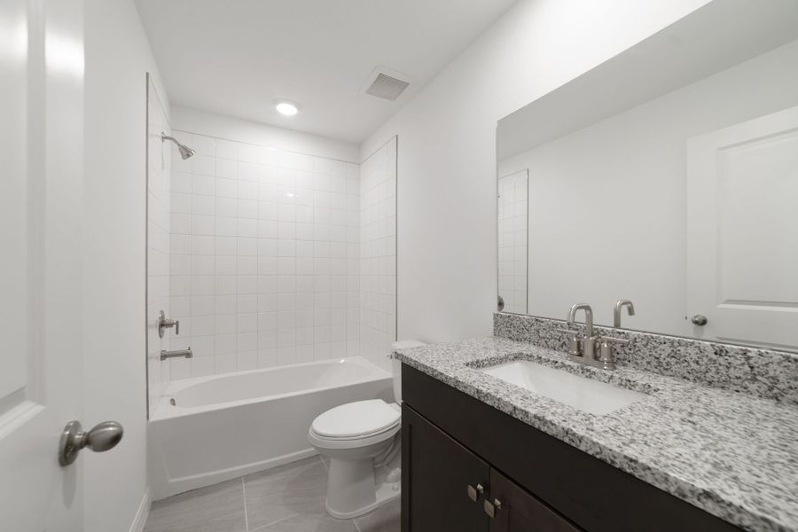 Furnished interior view inside a new home in Towns at Greenleaf, Oviedo (Image 9).