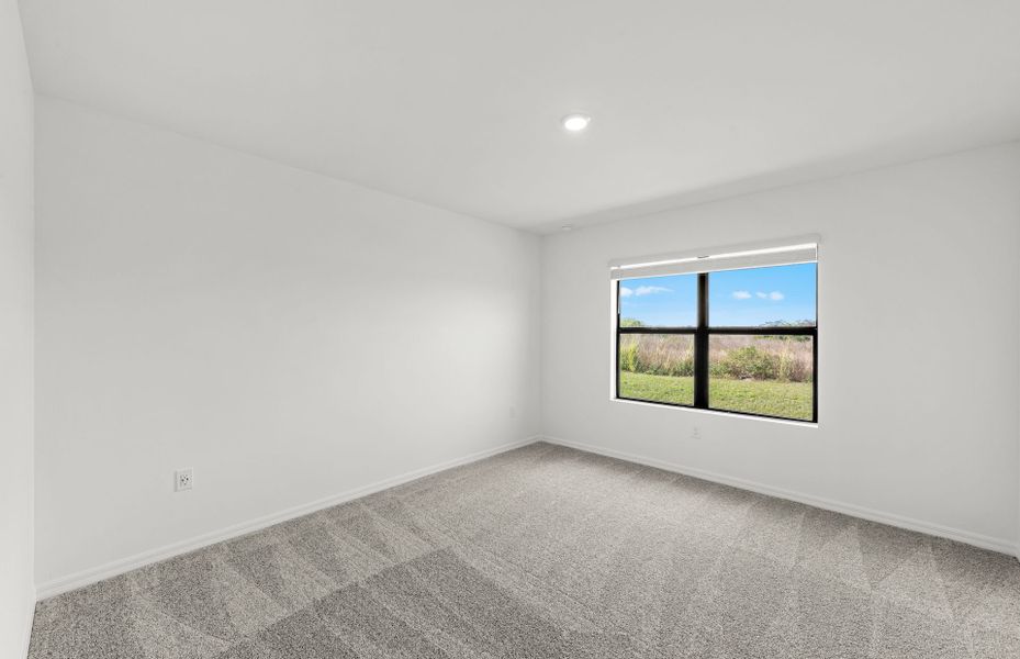 Spacious, unfurnished interior of a new home in Whispering Lakes, Lehigh Acres (Image 21).