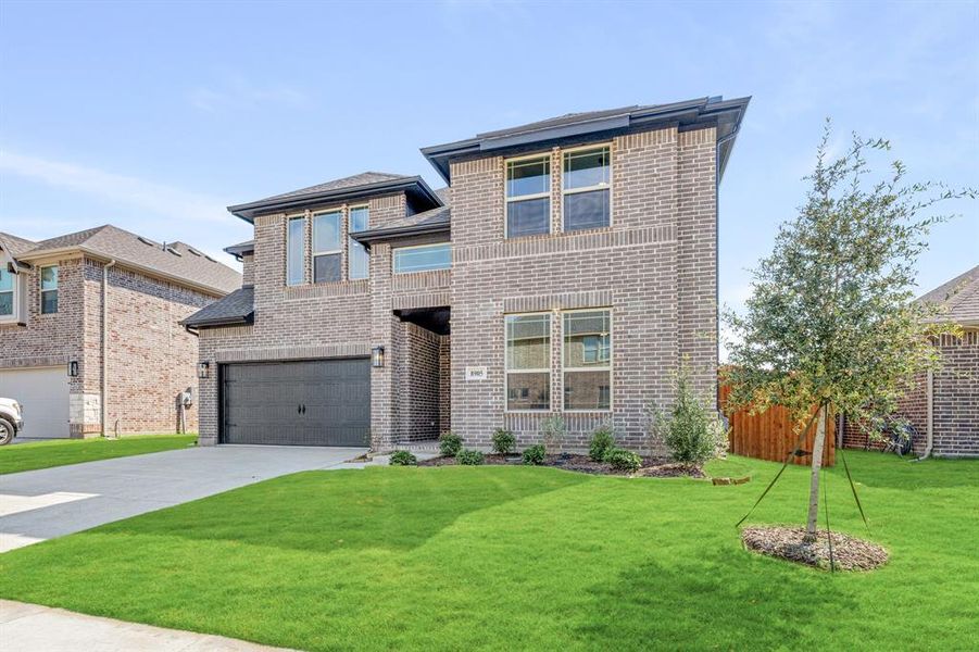 Front exterior of a new home in Country Lakes Classic 60, Argyle, TX, highlighting curb appeal (Image 2). Front exterior of a new home in Country Lakes Classic 60, Argyle, TX, highlighting curb appeal (Image 2).