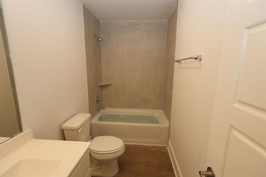 Furnished interior view inside a new home in Lone Star Landing, Montgomery (Image 8).