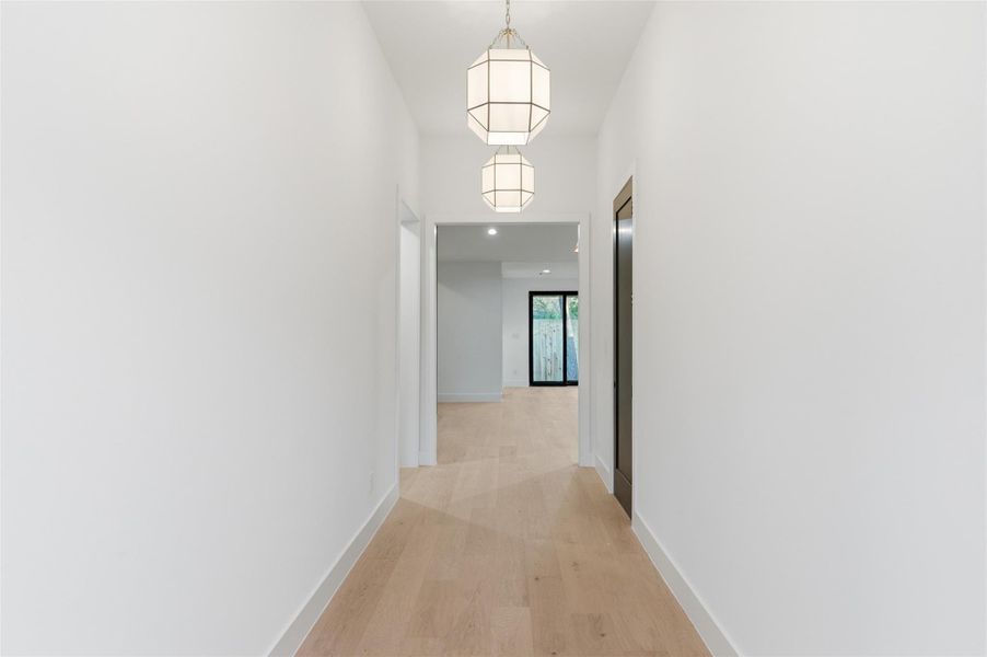 Contemporary elegance arrives in Oak Forest with this beautifully designed new construction home crafted for modern living.