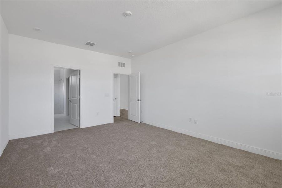 Spacious, unfurnished interior of a new home in Serenade at Ovation, Winter Garden (Image 24). Spacious, unfurnished interior of a new home in Serenade at Ovation, Winter Garden (Image 24).