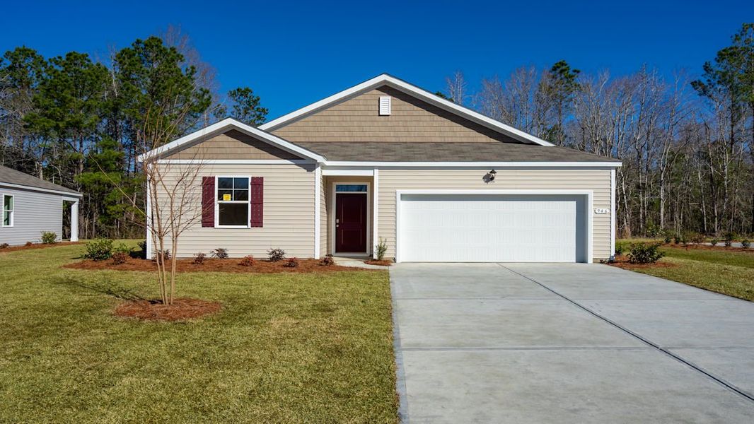 Representative exterior photo of a completed home built from the KERRY by D.R. Horton in The Reserve at Wild Horse, Conway, SC (Image 1).