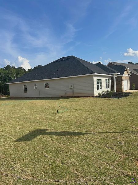 Front exterior of a new home in Barrington Place, Macon, GA, highlighting curb appeal (Image 2). Front exterior of a new home in Barrington Place, Macon, GA, highlighting curb appeal (Image 2).