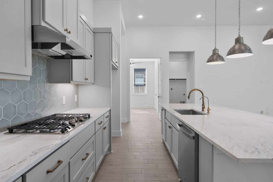 Representative furnished interior of a home built from the Summerton by Chesmar Homes in Grange, Katy (Image 7).