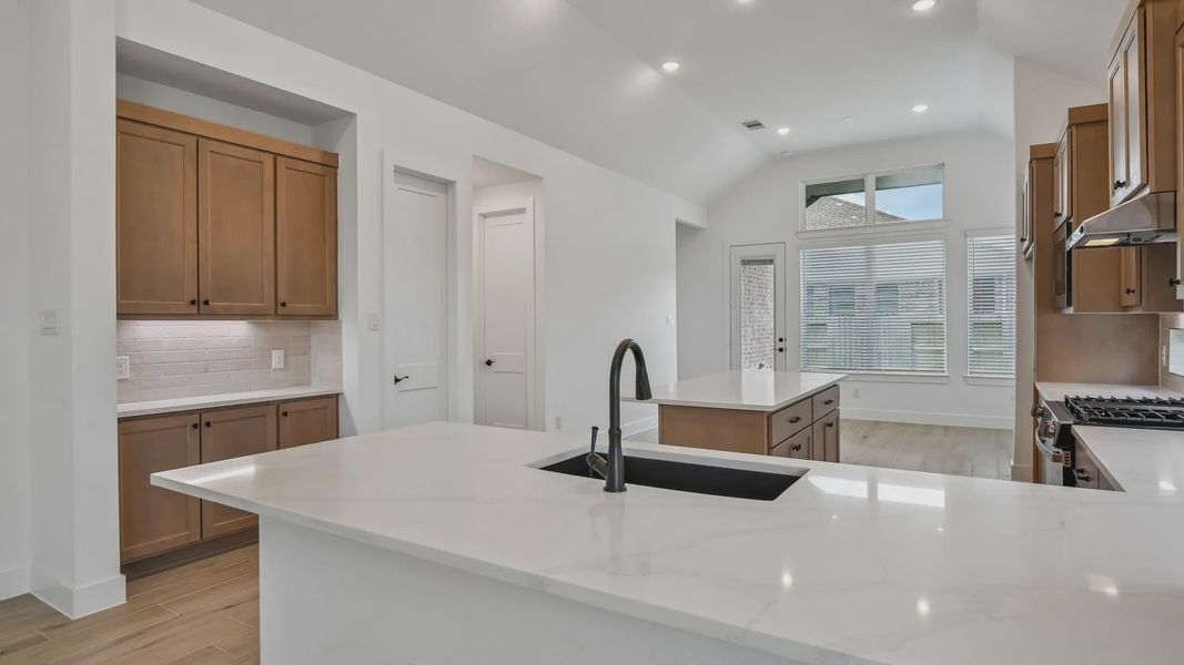 Furnished interior view inside a new home in Artavia, Conroe (Image 7).