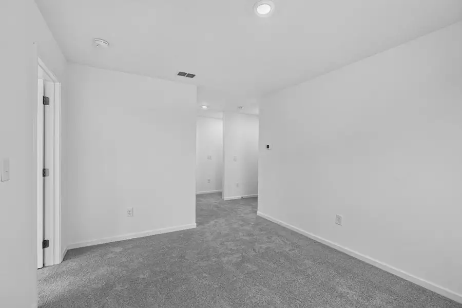 Spacious, unfurnished interior of a new home in Weatherfield, Buford (Image 40).
