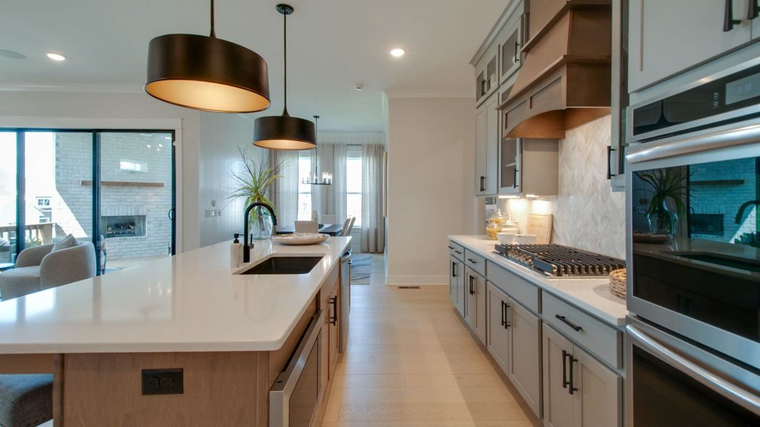Kitchen area opening up to dining area Kitchen area opening up to dining area