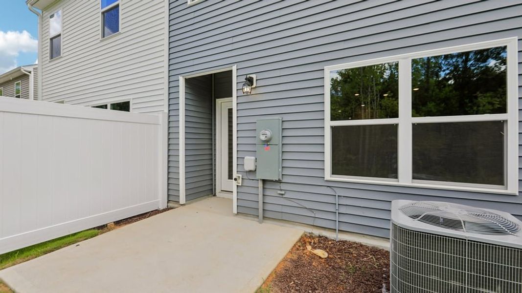 Exterior details and patio area of a home in The Townes at Martin Farms, Aberdeen (Image 4). Exterior details and patio area of a home in The Townes at Martin Farms, Aberdeen (Image 4).