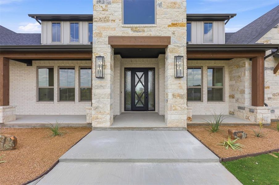 Exterior details and patio area of a home in , Granbury (Image 26).