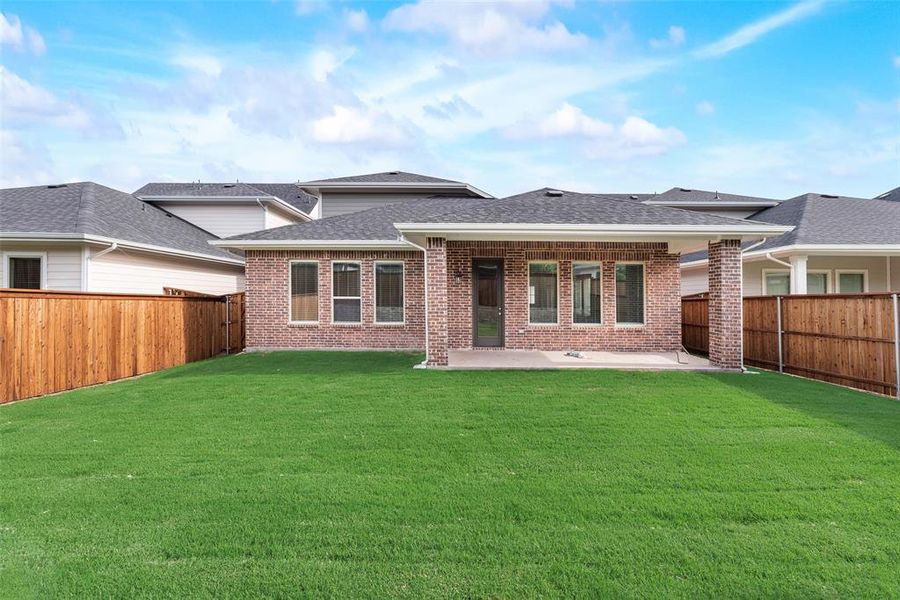 Front exterior of a new home in Bayside, Rowlett, TX, highlighting curb appeal (Image 17).