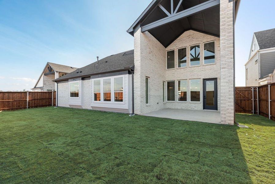 Exterior details and patio area of a home in Grand Estates of Anna, Anna (Image 3).