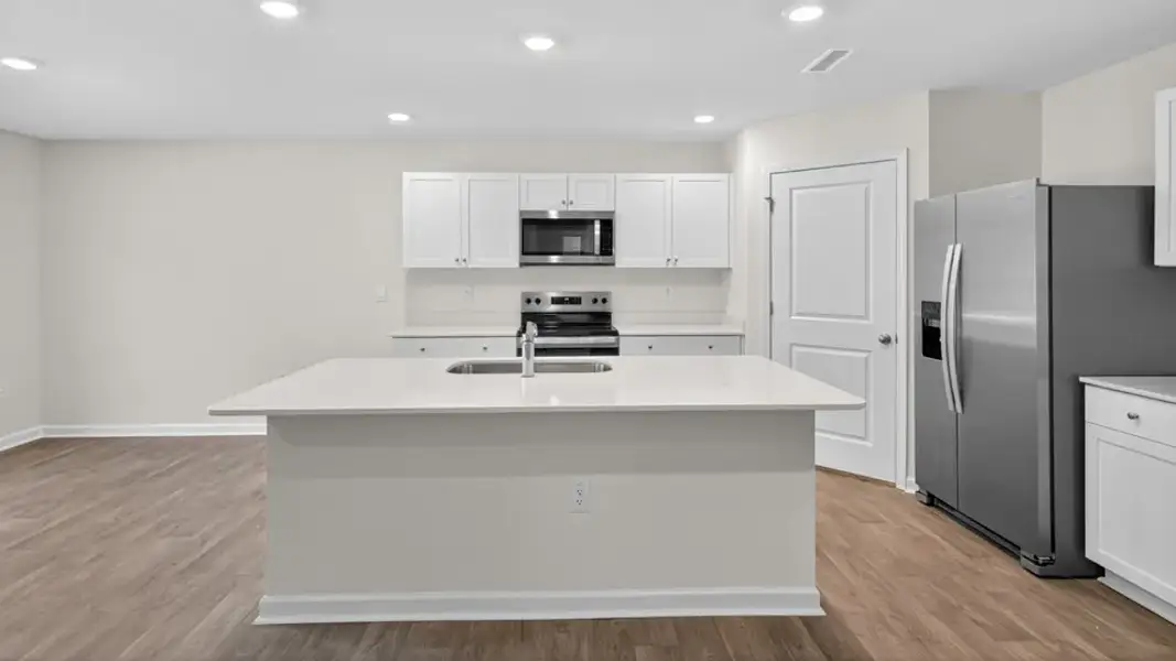 Furnished interior view inside a new home in Mangum Farms, Stem (Image 3).