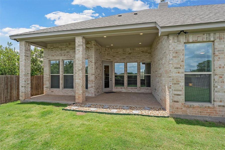 The covered rear patio helps the home stay cool throughout the day. The covered rear patio helps the home stay cool throughout the day.