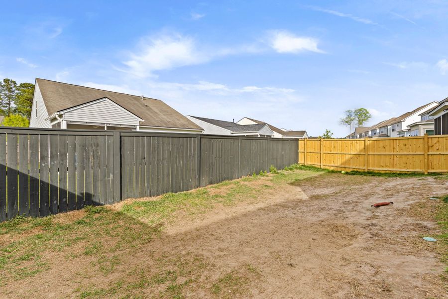 Exterior details and patio area of a home in , Charleston (Image 30).
