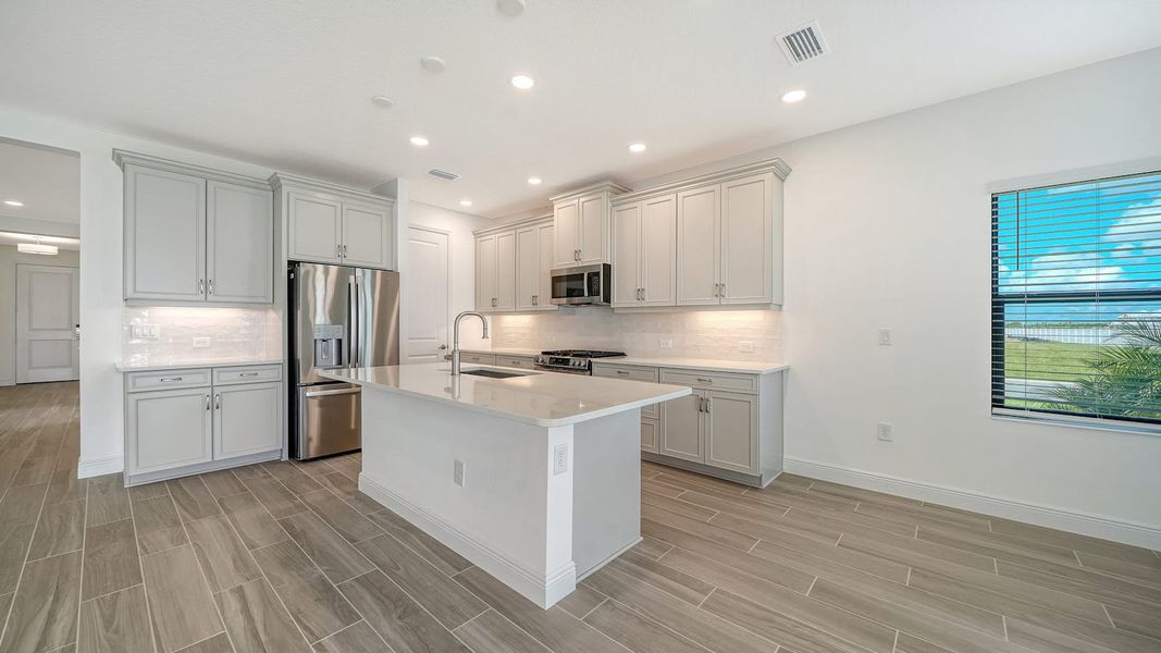 Furnished interior view inside a new home in Windward Real Estate and Homes for Sale in Sarasota, FL - Neal Communities, Lakewood Ranch (Image 8).