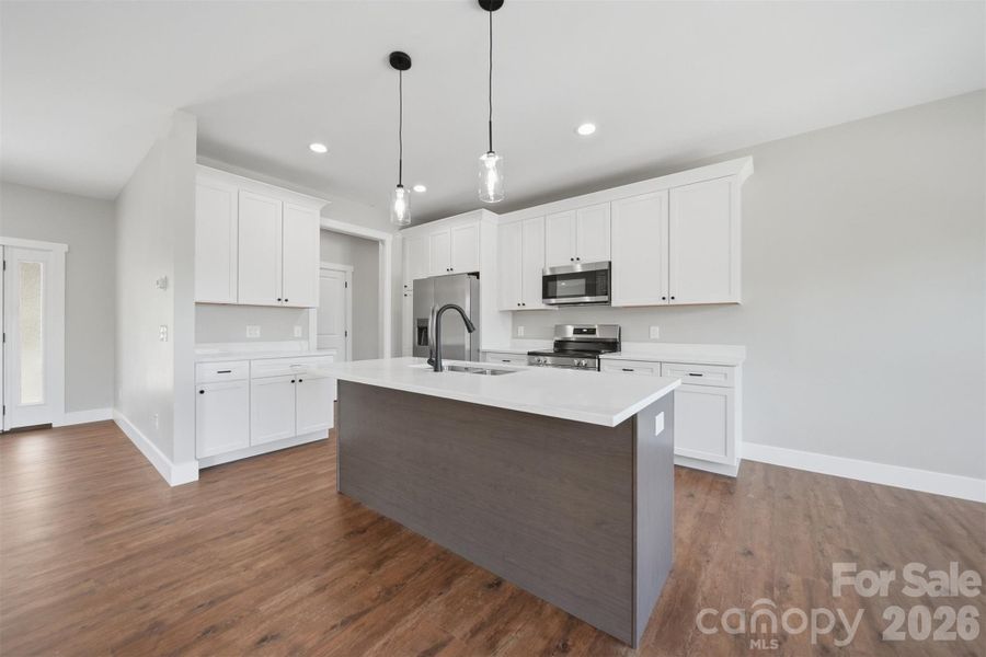 Furnished interior view inside a new home in , Lenoir (Image 7).