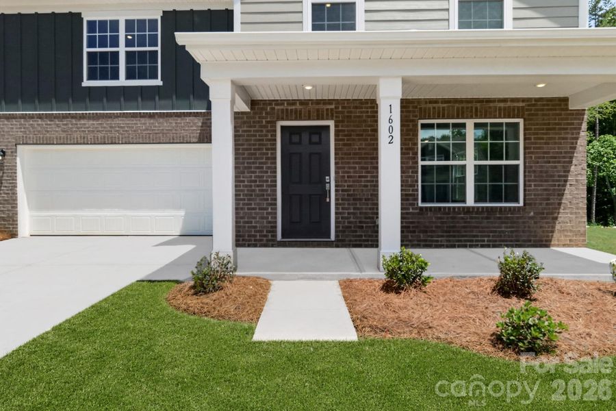 Exterior details and patio area of a home in Creekside Cottages, Bessemer City (Image 3).