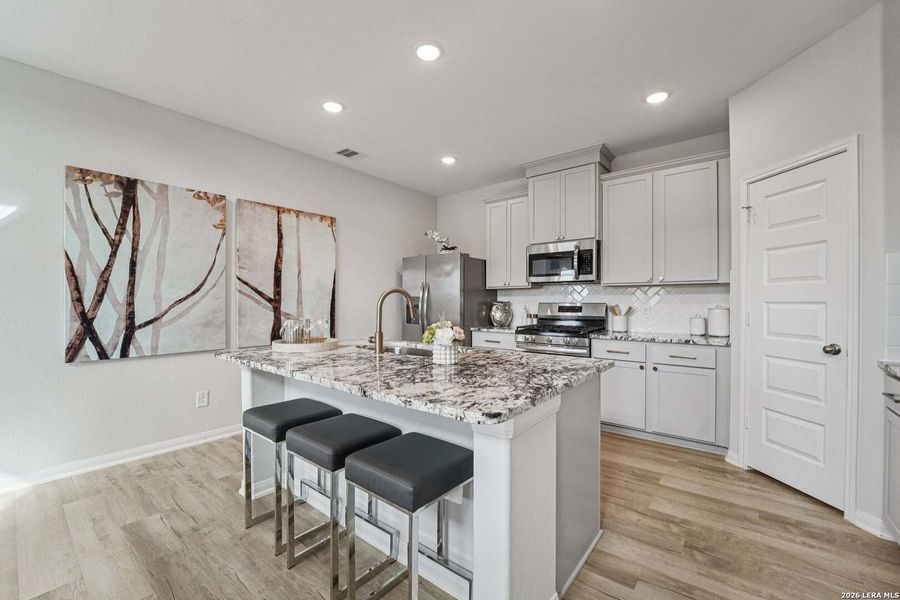 Furnished interior view inside a new home in Timber Creek, San Antonio (Image 6).
