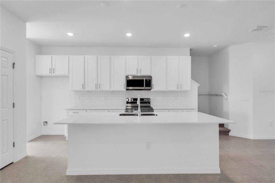 Furnished interior view inside a new home in The Residences at Emerson Park, Apopka (Image 4).