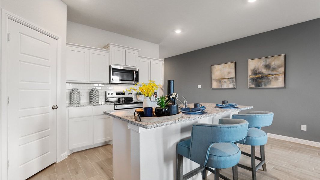 Representative furnished interior of a home built from the TEXAS MOCKINGBIRD by D.R. Horton in Rock Creek Ranch, Fort Worth (Image 5). Representative furnished interior of a home built from the TEXAS MOCKINGBIRD by D.R. Horton in Rock Creek Ranch, Fort Worth (Image 5).