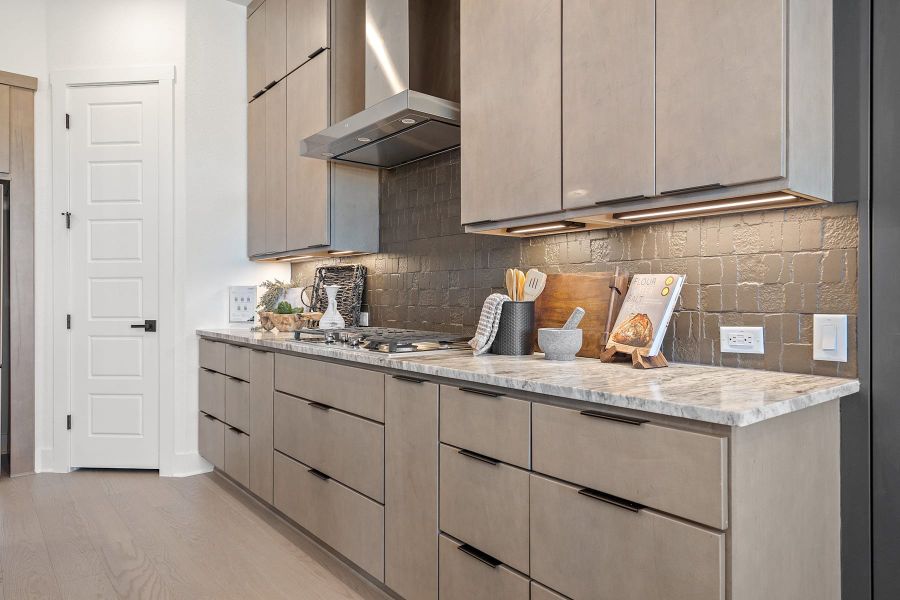 Furnished interior view inside a new home in Lagos Reserve, Manor (Image 17).