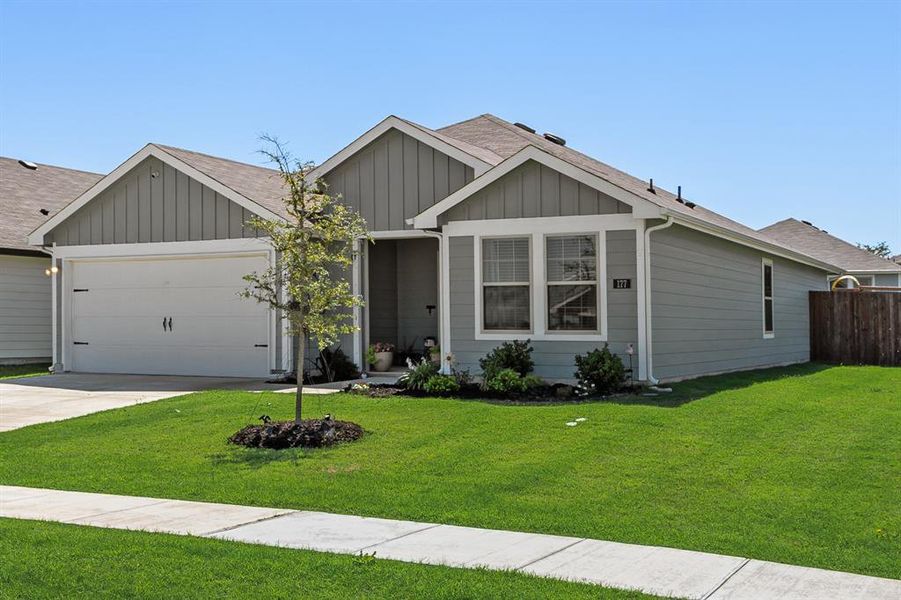 Front exterior of a new home in Wildwood, Royse City, TX, highlighting curb appeal (Image 20).