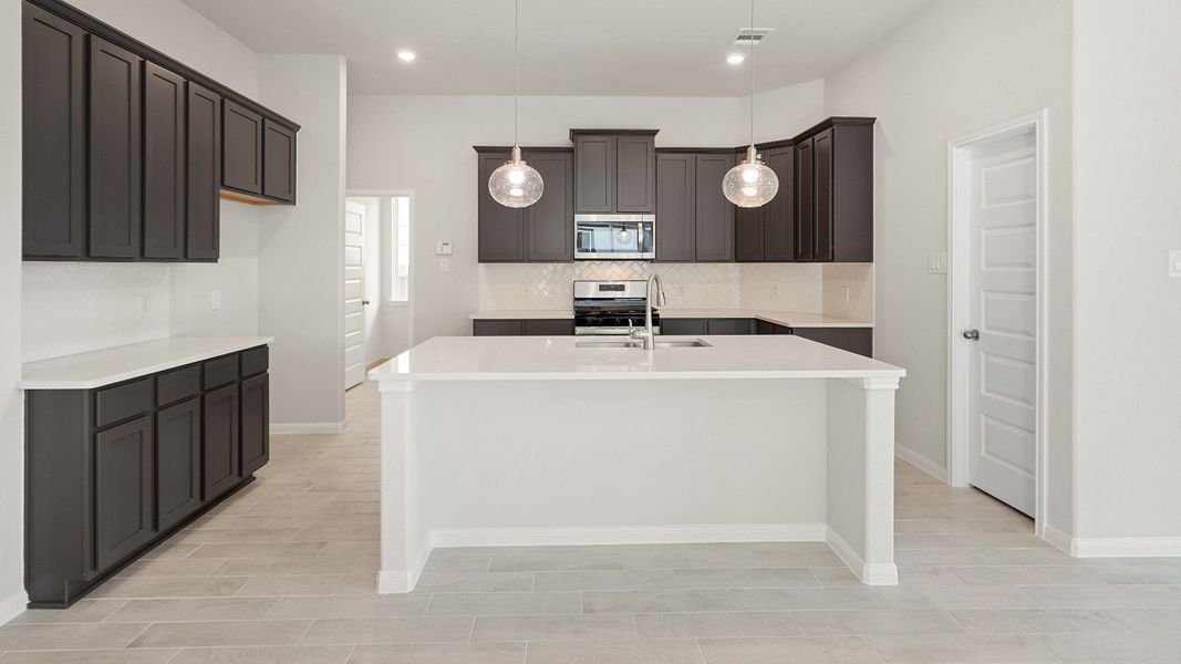 Representative furnished interior of a home built from the The Benbrook by Legend Homes in Bluestem, Brookshire (Image 5).