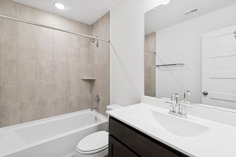 Furnished interior view inside a new home in Wildrye, Waller (Image 5).