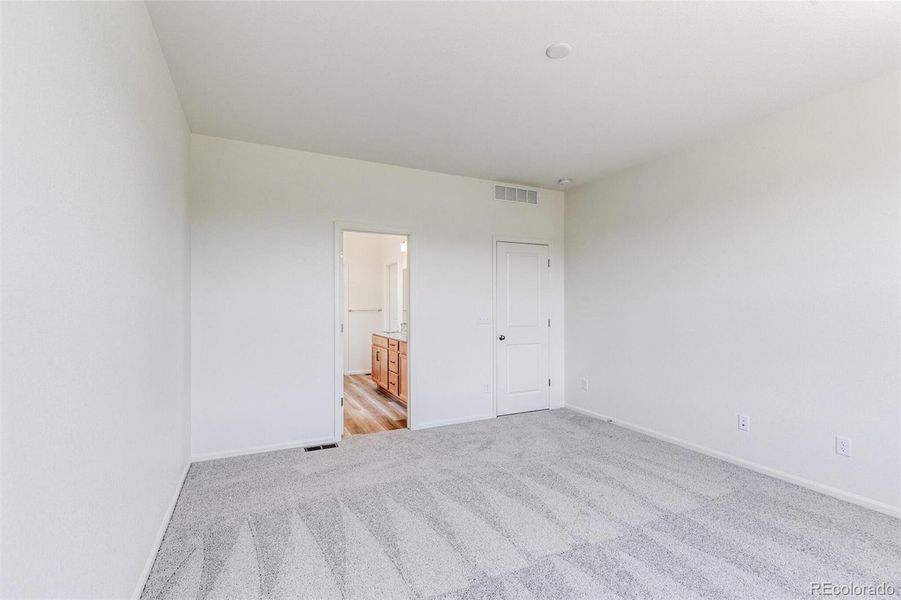 Spacious, unfurnished interior of a new home in Terrain Oak Valley, Castle Rock (Image 18).