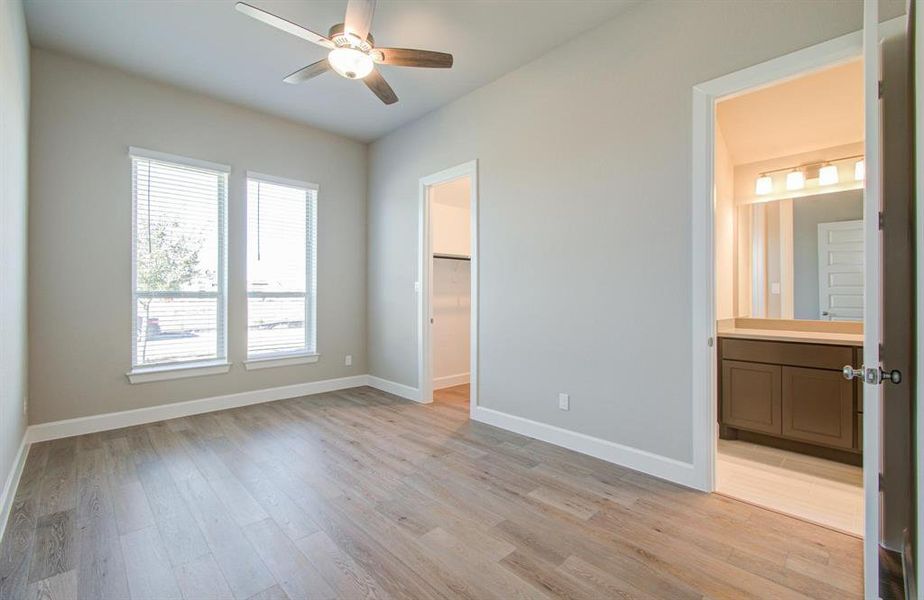 Bedroom 1 with Hollywood bath and walk-in closet