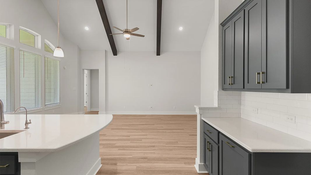 Representative furnished interior of a home built from the Brenner by Chesmar Homes in Newhaven, Manor (Image 11).