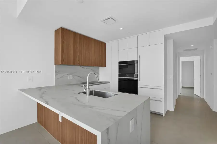 Furnished interior view inside a new home in , Miami (Image 7).