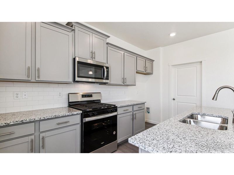 Furnished interior view inside a new home in Vantage, Berthoud (Image 8).