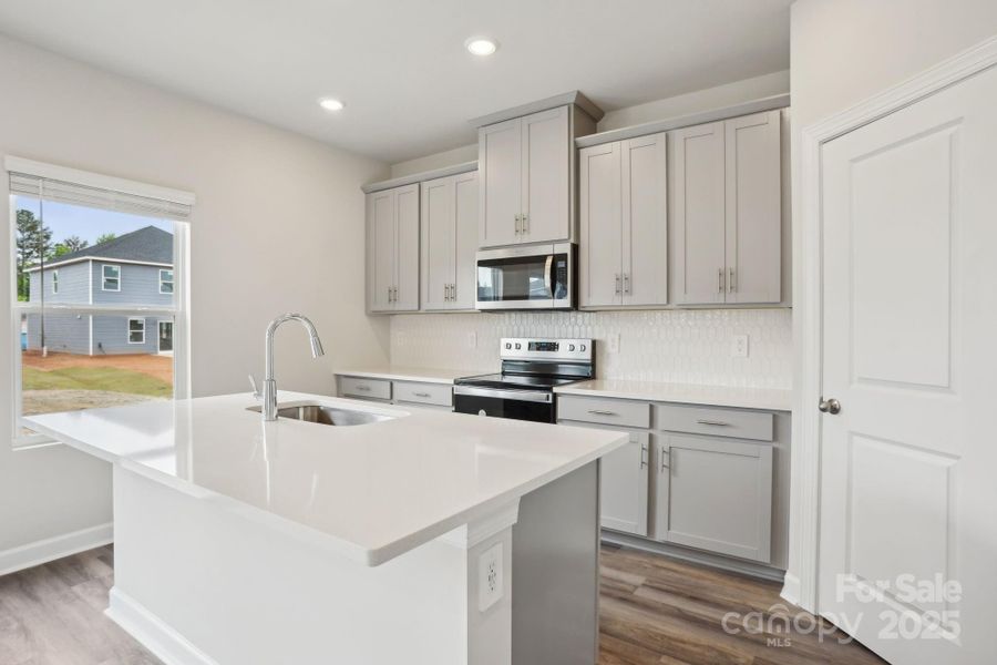 Photo is not of the actual home, but is an inspirational photo of builder’s model home and may depict options, furnishings, and/or decorator features that are not included