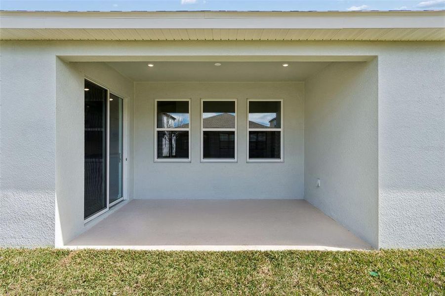 Exterior details and patio area of a home in Isles at Bayview, Parrish (Image 31). Exterior details and patio area of a home in Isles at Bayview, Parrish (Image 31).