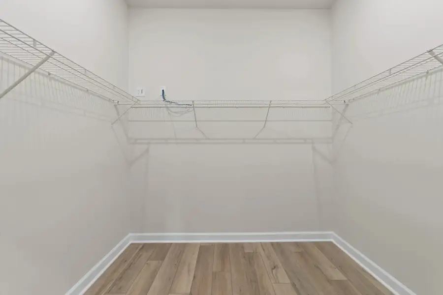 Sample Primary Walk-in Closet photo. Actual structural options and design finishes of home may vary.
