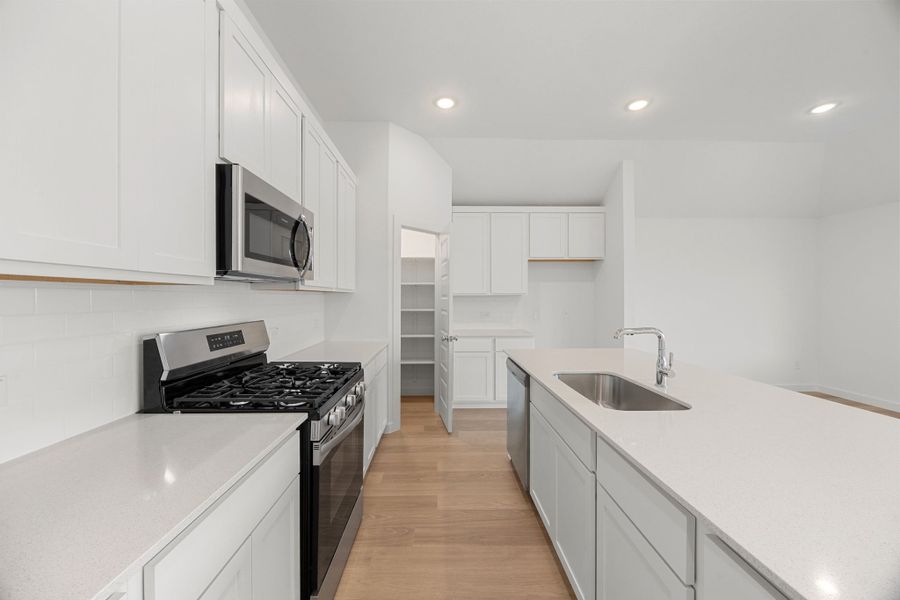 Representative furnished interior of a home built from the Brazos | Prairie Winds by Trophy Signature Homes in Prairie Winds, Hutto (Image 6).