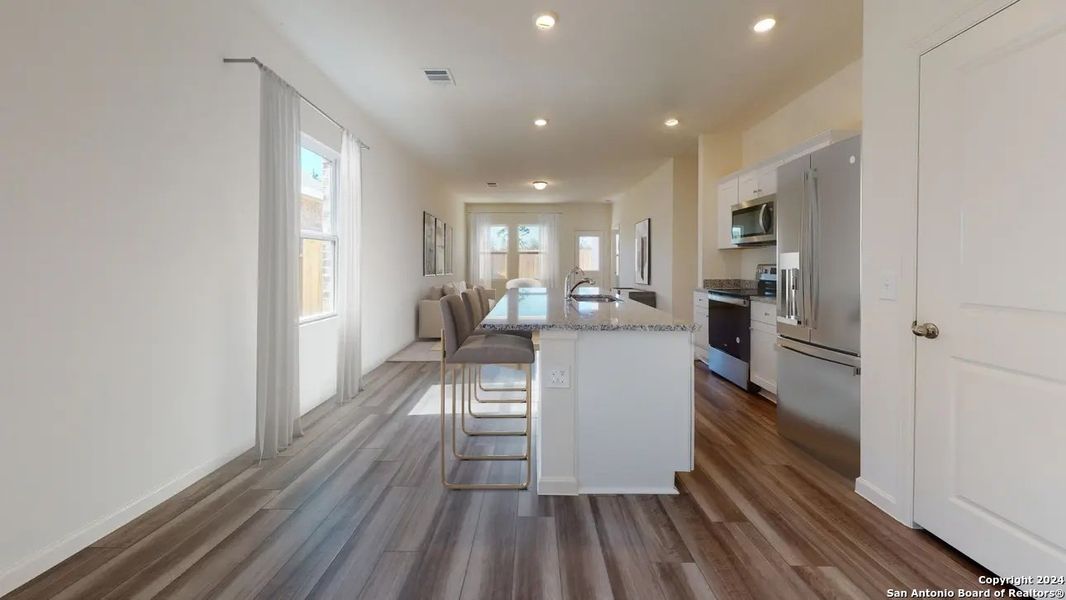 Furnished interior view inside a new home in Hennersby Hollow, San Antonio (Image 6).