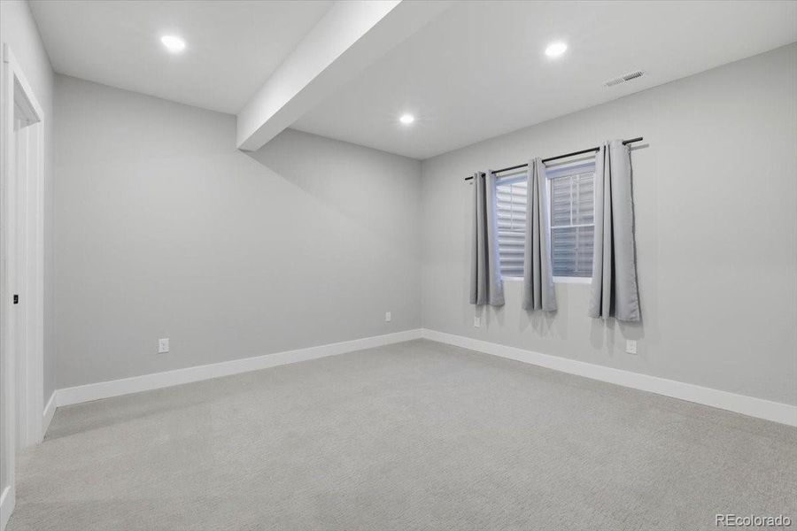 The home's third bedroom is located on the basement level.