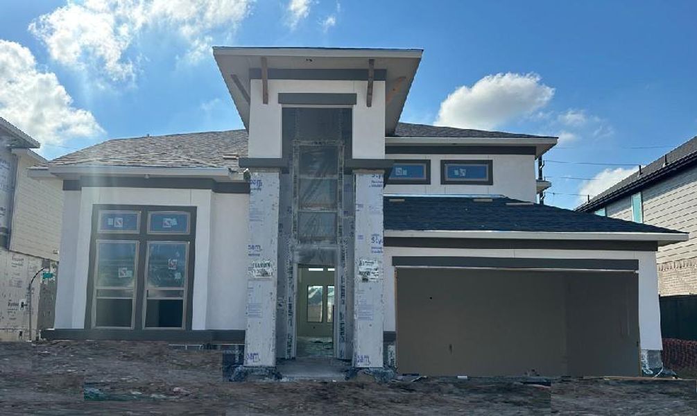 Exterior details and patio area of a home in Harvest Green - Final Opportunities, Richmond (Image 2).
