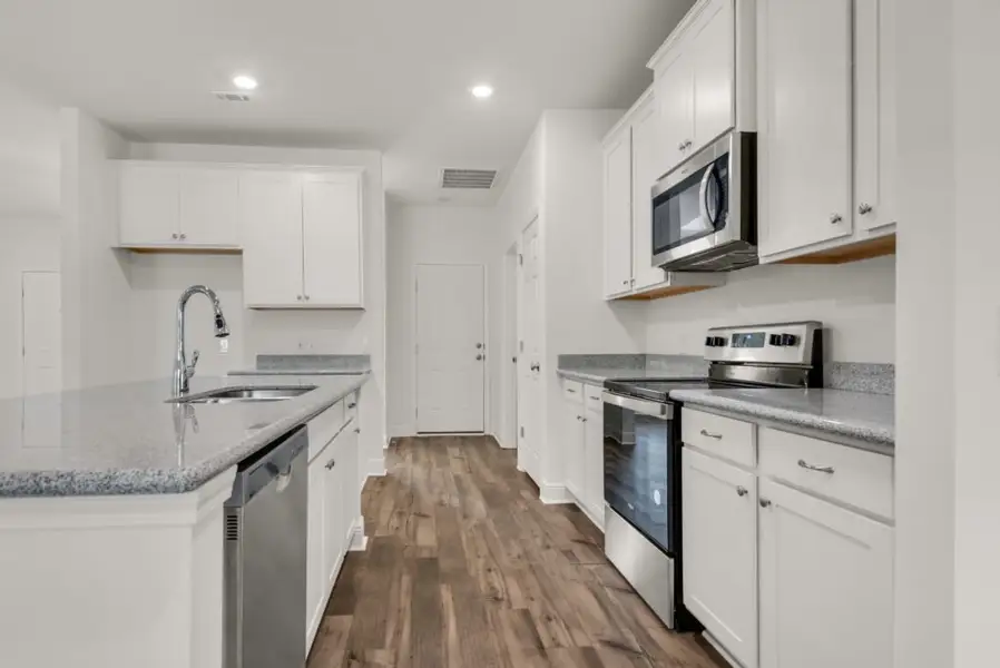 Furnished interior view inside a new home in Sanborn Hill, Milton (Image 4).