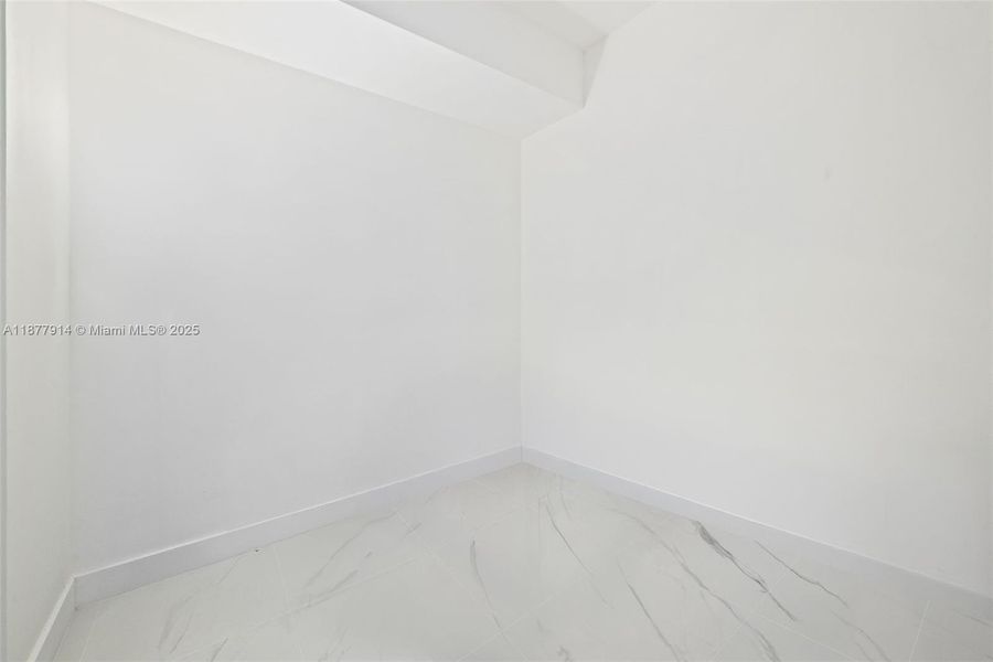 Spacious, unfurnished interior of a new home in Aria Reserve, Miami (Image 28). Spacious, unfurnished interior of a new home in Aria Reserve, Miami (Image 28).