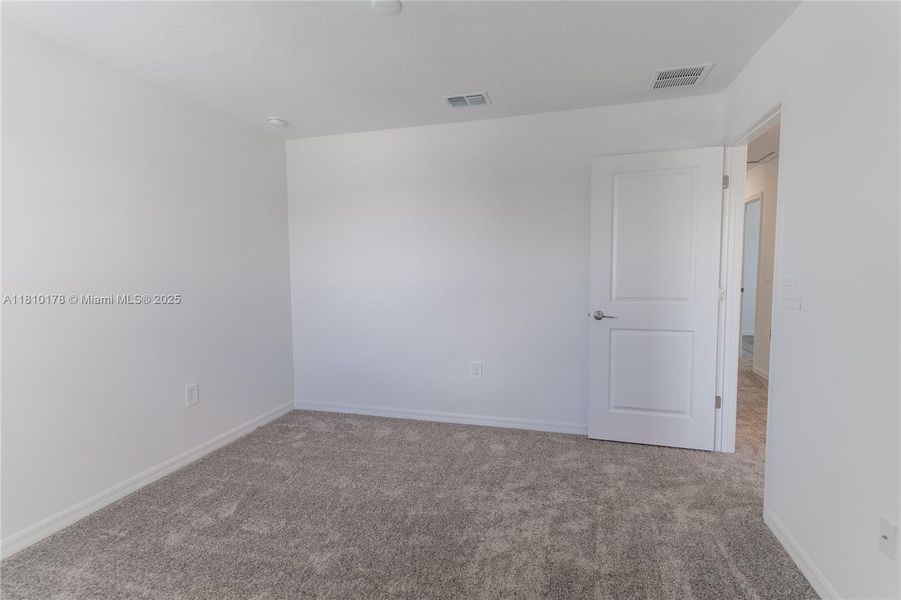Spacious, unfurnished interior of a new home in Inman Groves, Winter Haven (Image 19). Spacious, unfurnished interior of a new home in Inman Groves, Winter Haven (Image 19).